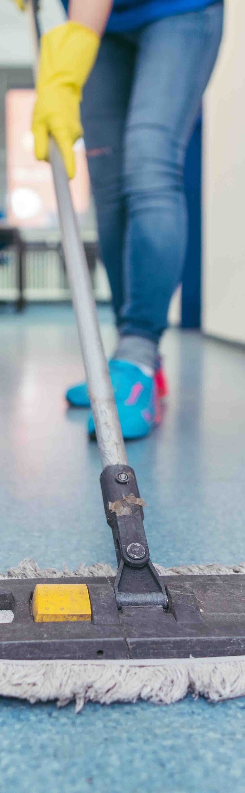 Vertical-Cleaning-smaller Mop on floor